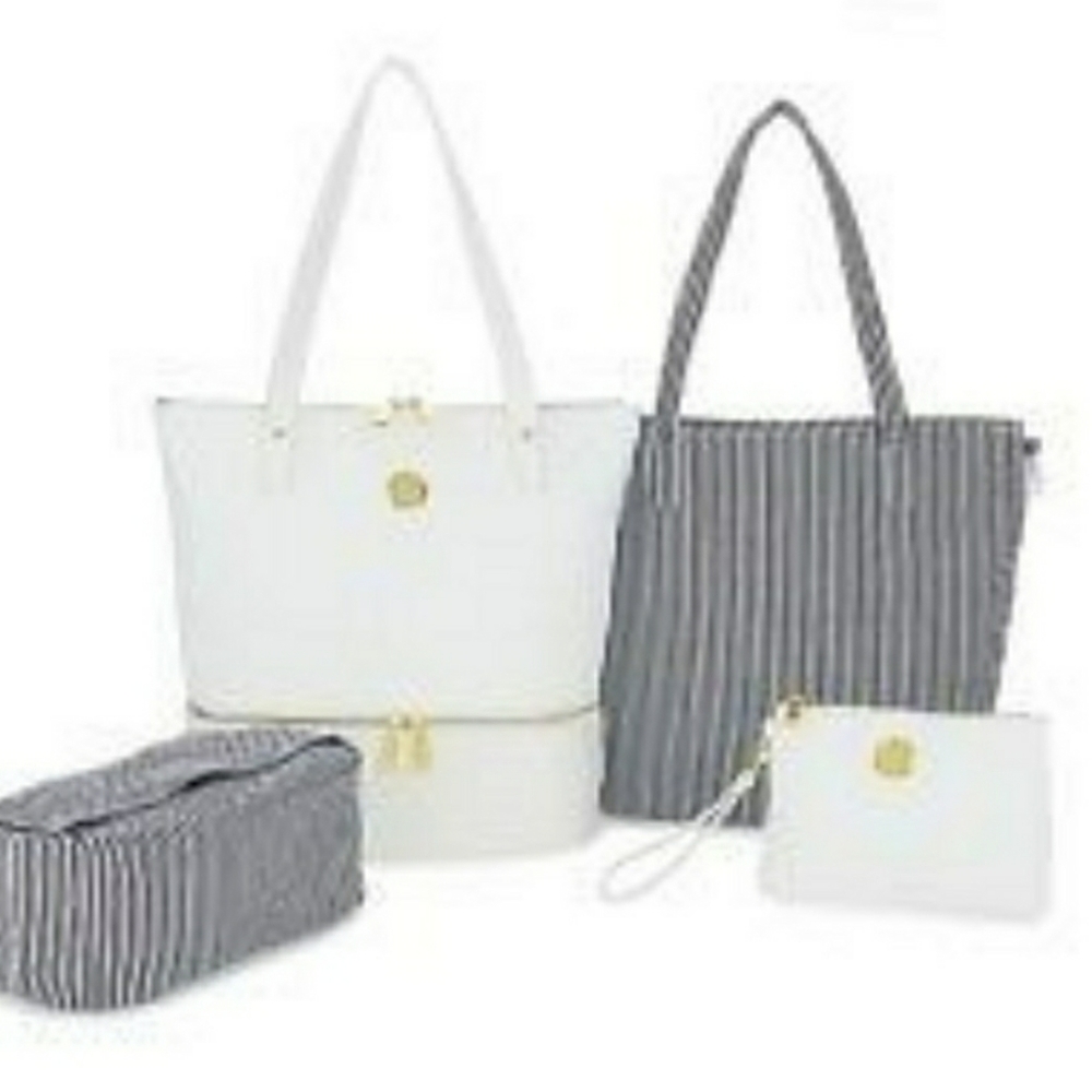 4 PC Travel Bag Joy Mangano NWT Double Zippers. I have WHITE or BLUSH PINK